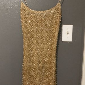 Oh Polly drop a glint dress in gold